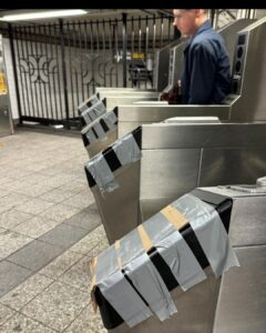 OMNY readers covered with cardboard and duct tape
